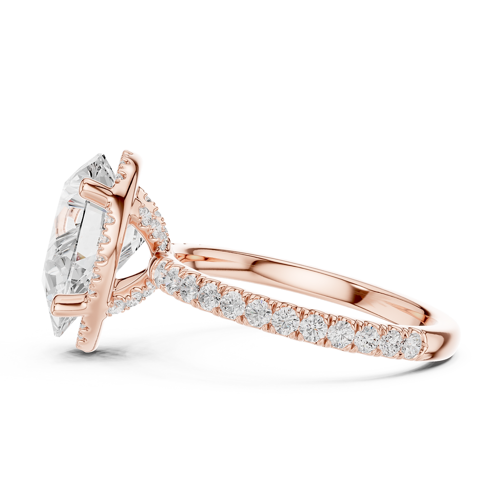 Thumbnail: Rose gold Aurora pear engagement ring side profile showing the crossed gallery, hidden halo, and pavé details.
