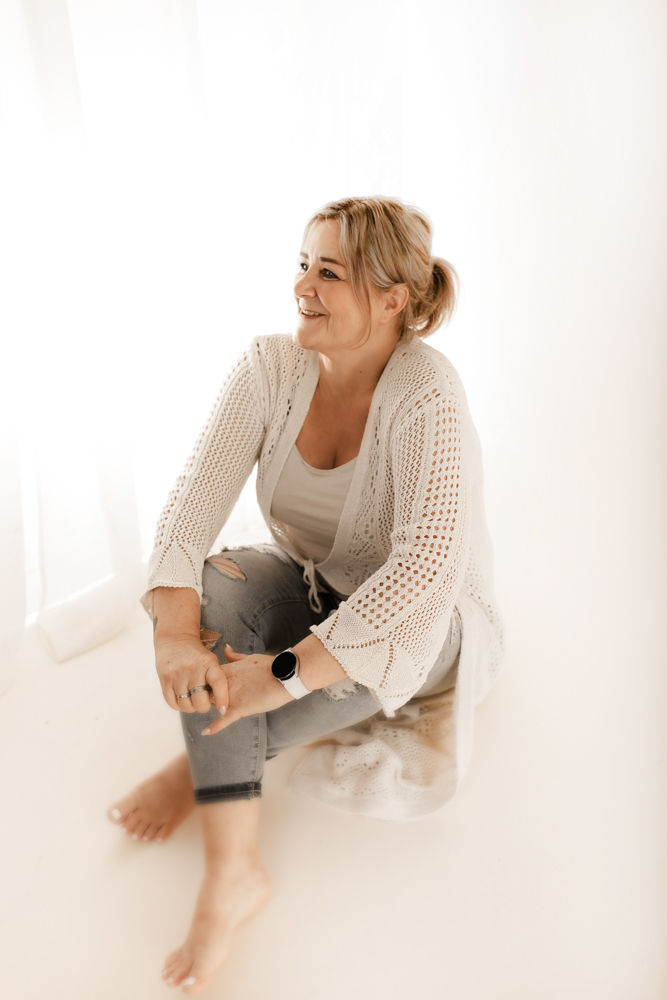 Peggy Lang im Gespräch mit einer Familie