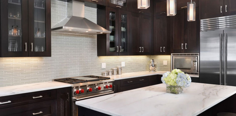 Espresso wood high end kitchen cabinets with white marble countertops in a Nashville, TN kitchen.