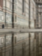 Reflection of the Duomo after the rain in Florence Italy