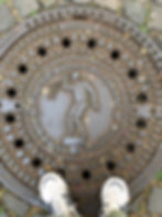 Schängel Fountain at well cover in Koblenz Germany