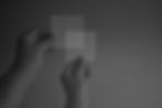 cropped-hands-people-holding-wax-papers-against-wall.jpg