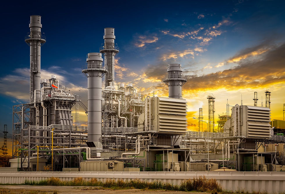 Natural gas power generation plant at sunset