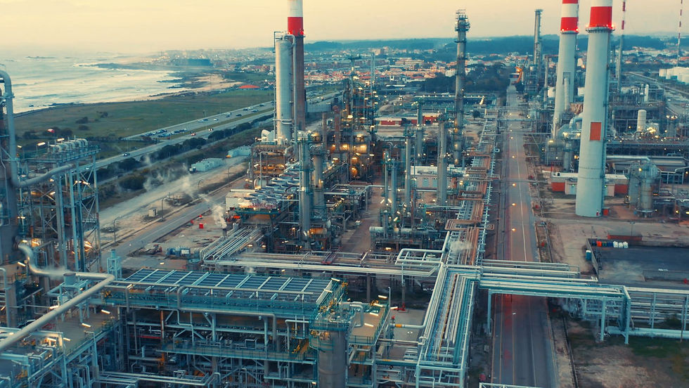 Refinery process units at dusk