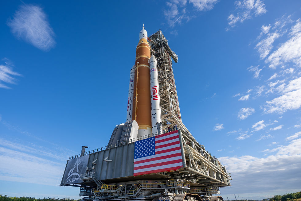 Rocket on a launch platform with an American flag