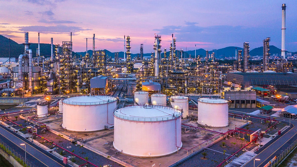 Refinery and petrochemical storage tanks at dusk