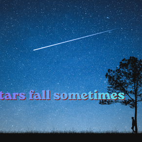 A clear sky with a falling star and a mans silhouette leaning against a tree