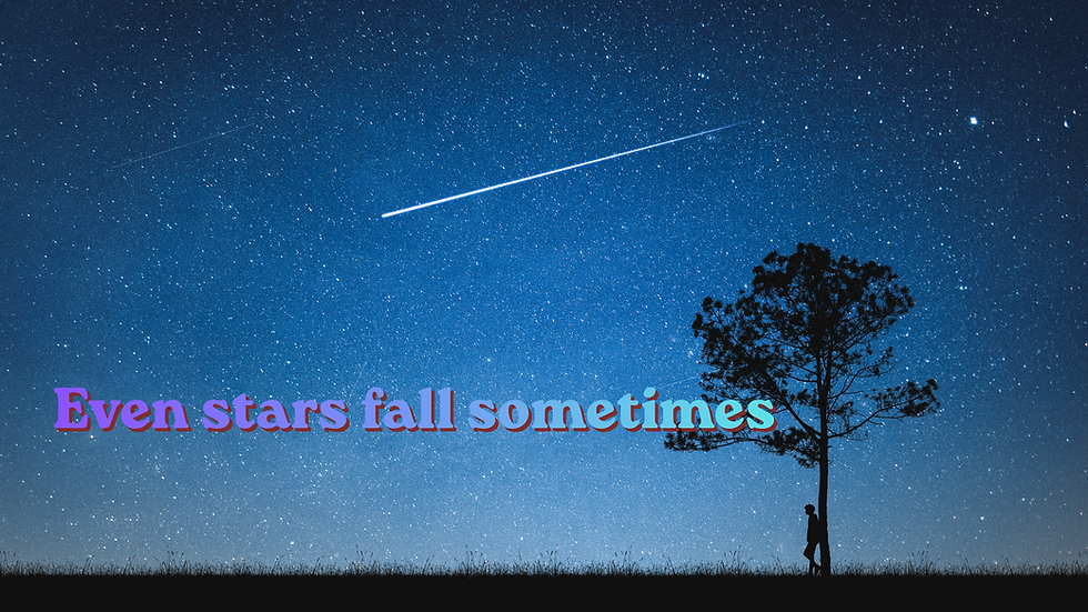 A clear sky with a falling star and a mans silhouette leaning against a tree