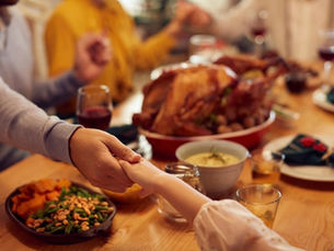 Thanksgiving prayer around table
