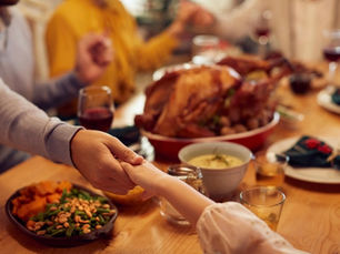 Thanksgiving prayer around table