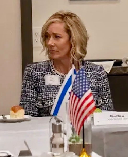Shiry Sapir, Kim Miller and Peter Gentala engage at a recent luncheon with Israeli Ambassador Yechiel Leiter.