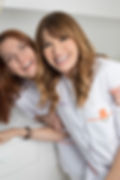 Two smiling Yiannikos Dentistry staff members