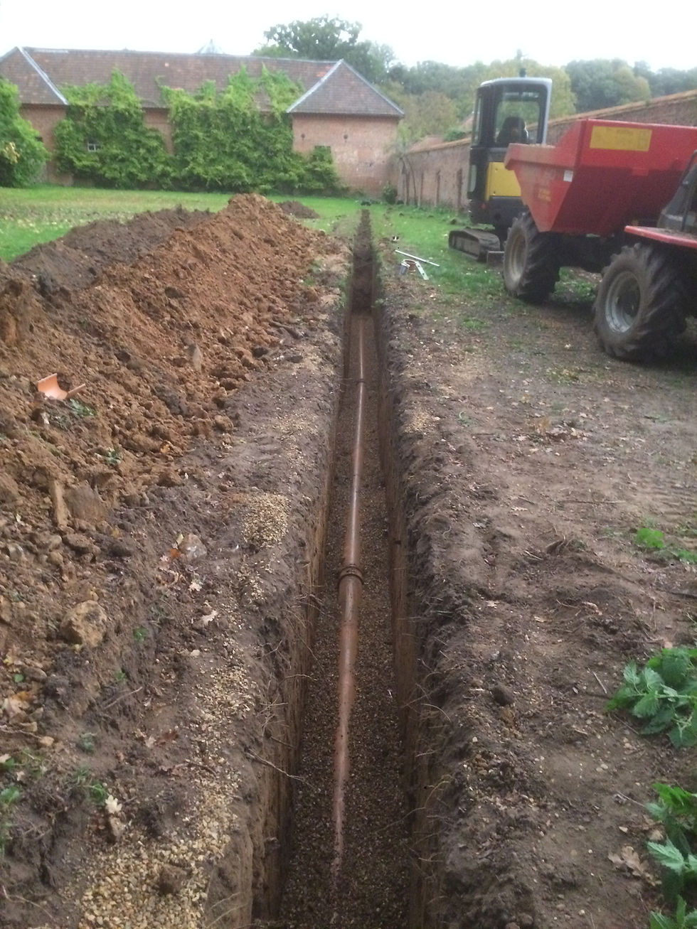 Trench dug for pipe installation, Norfolk Plant Serv