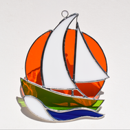 Stained glass sailboat sunset