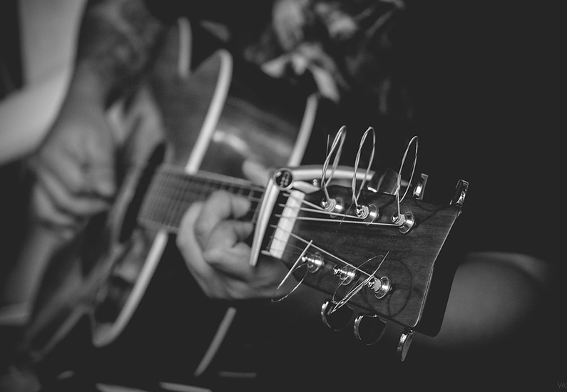 Man Playing Guitar