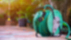 Green garden hose on reel.