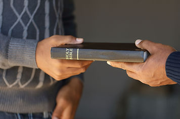 handing a book.jpg