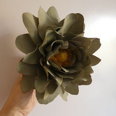 A large flower head created with eucalyptus and craspedia