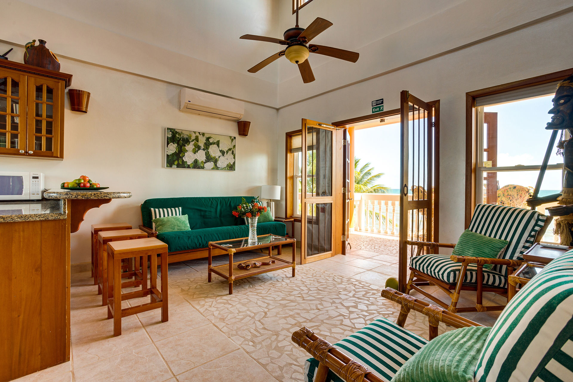 living room opens up the beach luxury bedroom placencia belize villas