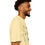 Thumbnail: T-shirt with a line drawing odd a relaxed looking child stimming by listening to music, using a tangle fidget, and moving. The shirt has text that says "Let Kids Stim" | color: banana
