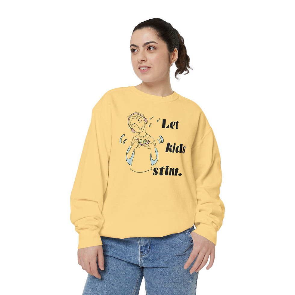 Thumbnail: A butter yellow crewneck sweatshirt that says "Let kids stim." There is an image of a boy listening to music with headphones while he stims with a tangle fidget and moves rhythmically.