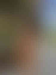 girl wearing bow crewneck