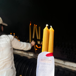 Prayer candle at Fatima Sanctuary in front of the Basilica during daytime