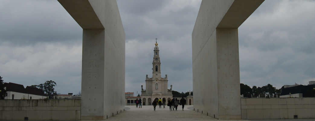 A view of a bridge with a clock tower in the background_edited.jpg