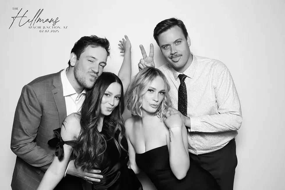 Friends making fun poses in a black and white photo booth portrait in Coeur d'Alene