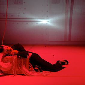 Natasha Tsakos as Zero in UP WAKE. Featuring the "Love Suitcase" from UP WAKE designed by Carolina Pagani