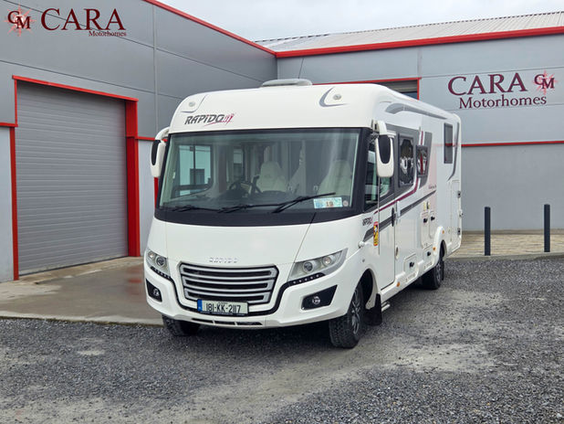 The Rapido i96 Distinction is a luxury A-class motorhome built for high-end touring, combining stylish design with premium comfort. It features an automatic transmission for easy driving and a spacious, well-finished interior with a front lounge, modern kitchen, and a large, hotel-style washroom.
At the rear, it offers a height-adjustable island bed with plenty of storage, along with an additional drop-down bed for extra sleeping space. As part of the Distinction range, it comes fully loaded with high-spec extras, making it ideal for those seeking a top-tier, comfortable travel experience.
