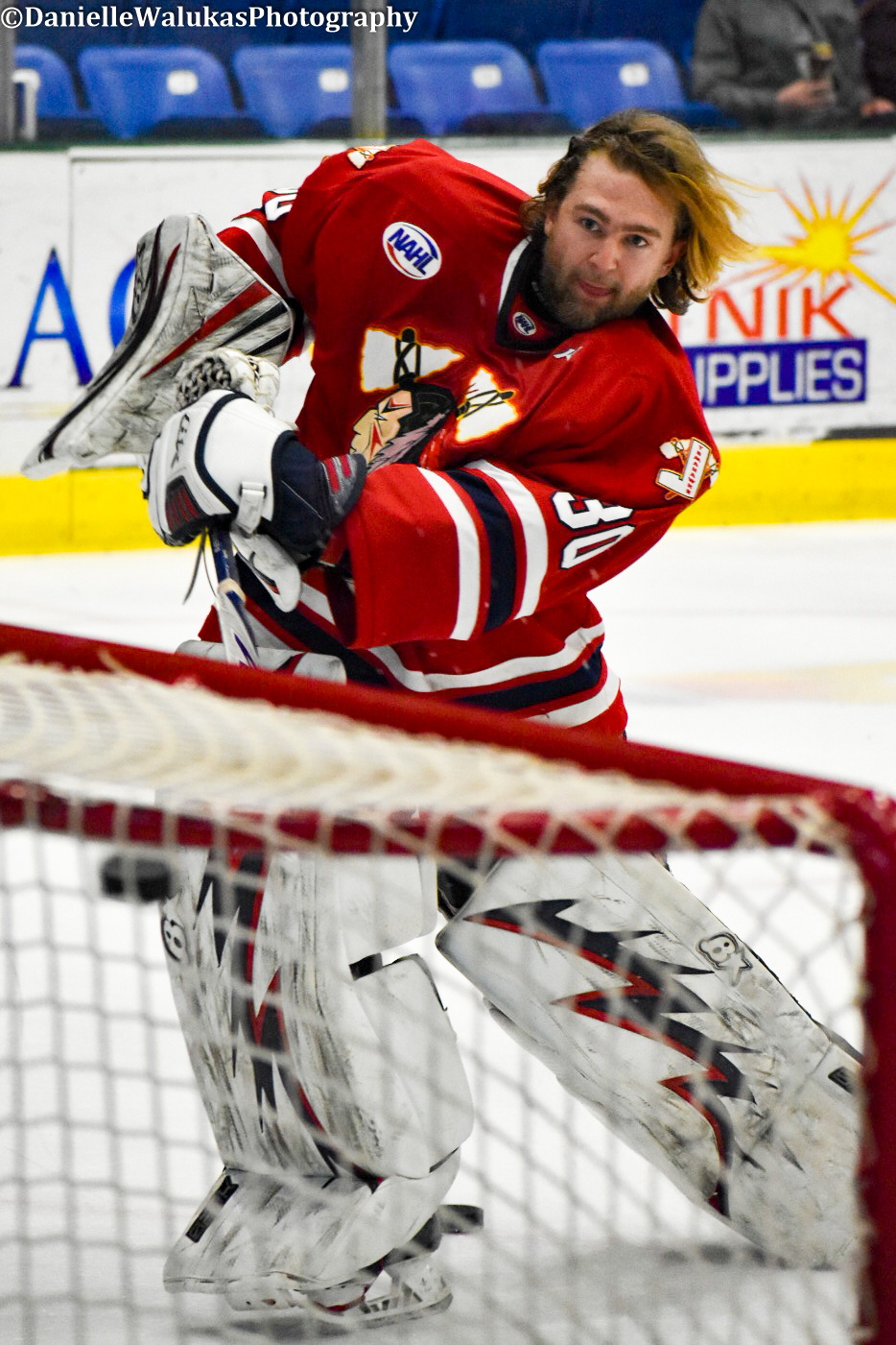 Carter McPhail taking a shot on his own goal during warm ups with the Johnstown Tomahawks.