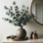 faux eucalyptus in a matte ceramic vase