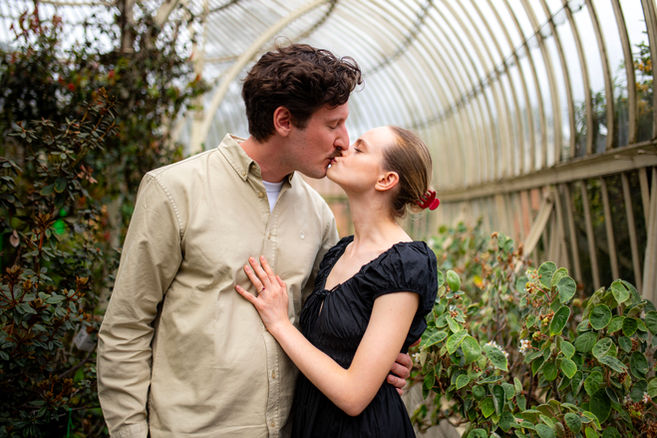 couple kissing in national botanical gardens green house