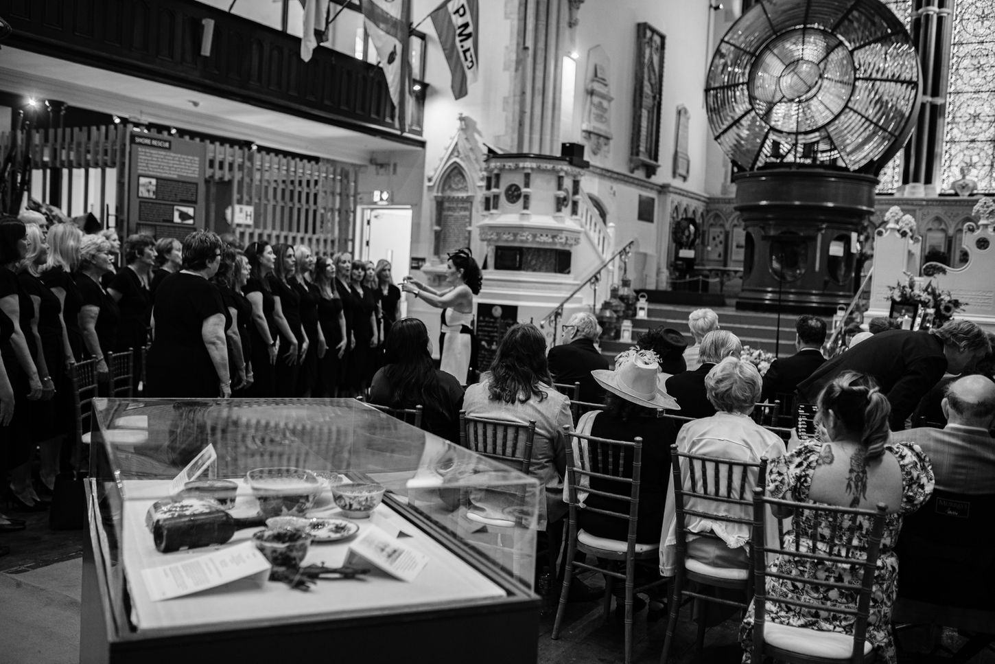 choir and guests seated at dublin maritime museum-waiting for bride's entrance to wedding