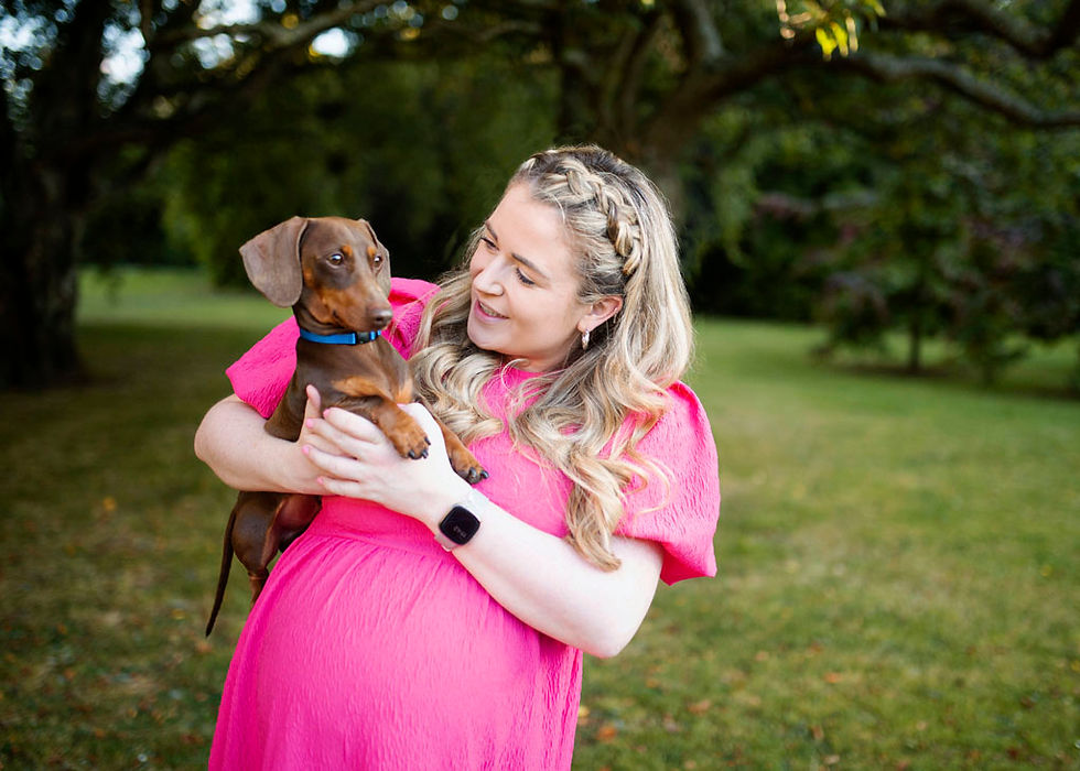 maternity portrait with pregnant woman and her dog