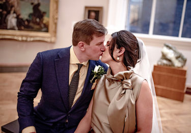 close up detail of bride and groom kissing each other