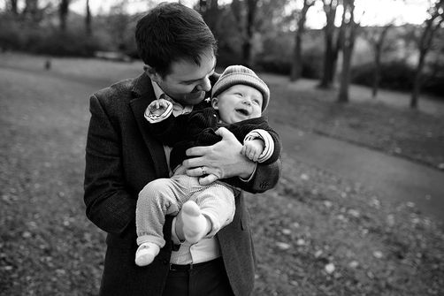 close up of laughing baby boy, black & white
