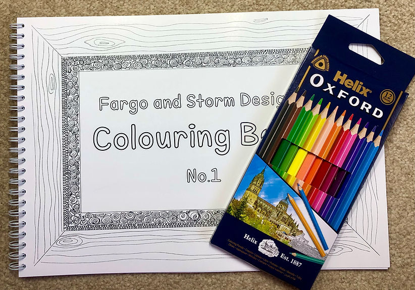 colouring book and pencils