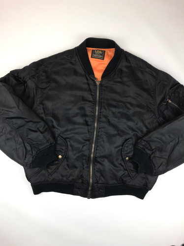 black bomber jacket with orange lining