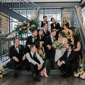 Bride, groom, bridal party, grand staircase, industrial, modern, flowers, cream city brick, elope, marriage, group photo, milwaukee, west Milwaukee, 
