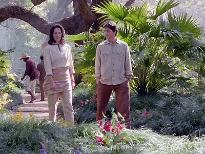 A peaceful garden scene with two individuals walking, symbolizing harmony, connection, and the exploration of spiritual insights.