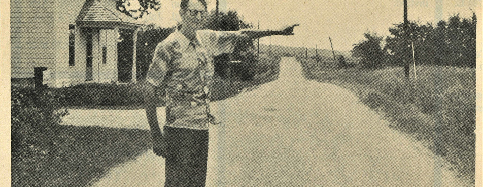 Ivan Losey pointing in the direction of Noodletoozy from his home on Township Road 201