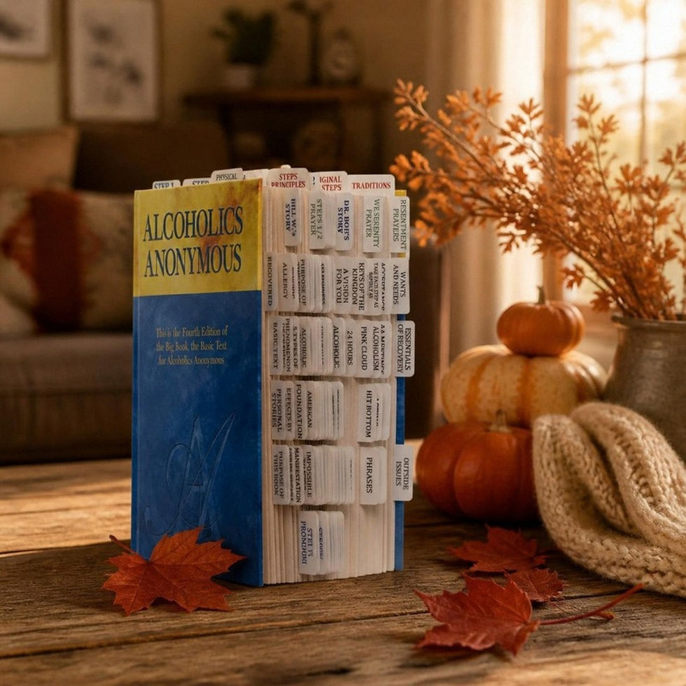 Tabbed AA Big Book with small pumpkins, autumn leaves and a knit blanket