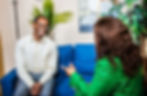 Supportive dialogue between Jennifer Bradley and a male patient at The Carrington Clinic.