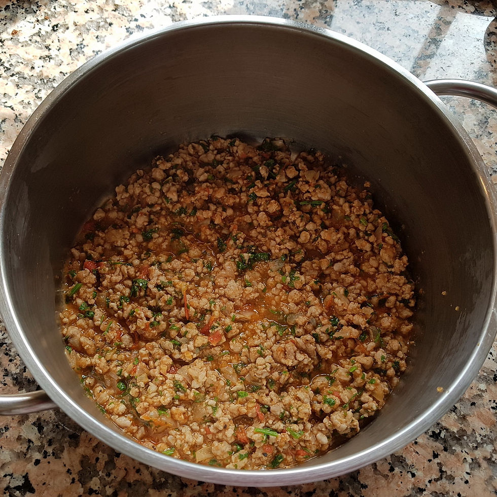 add a layer of meat sauce in a medium size casserole
