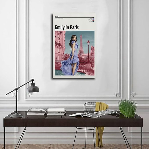 desk in office with poster print hanging on wall