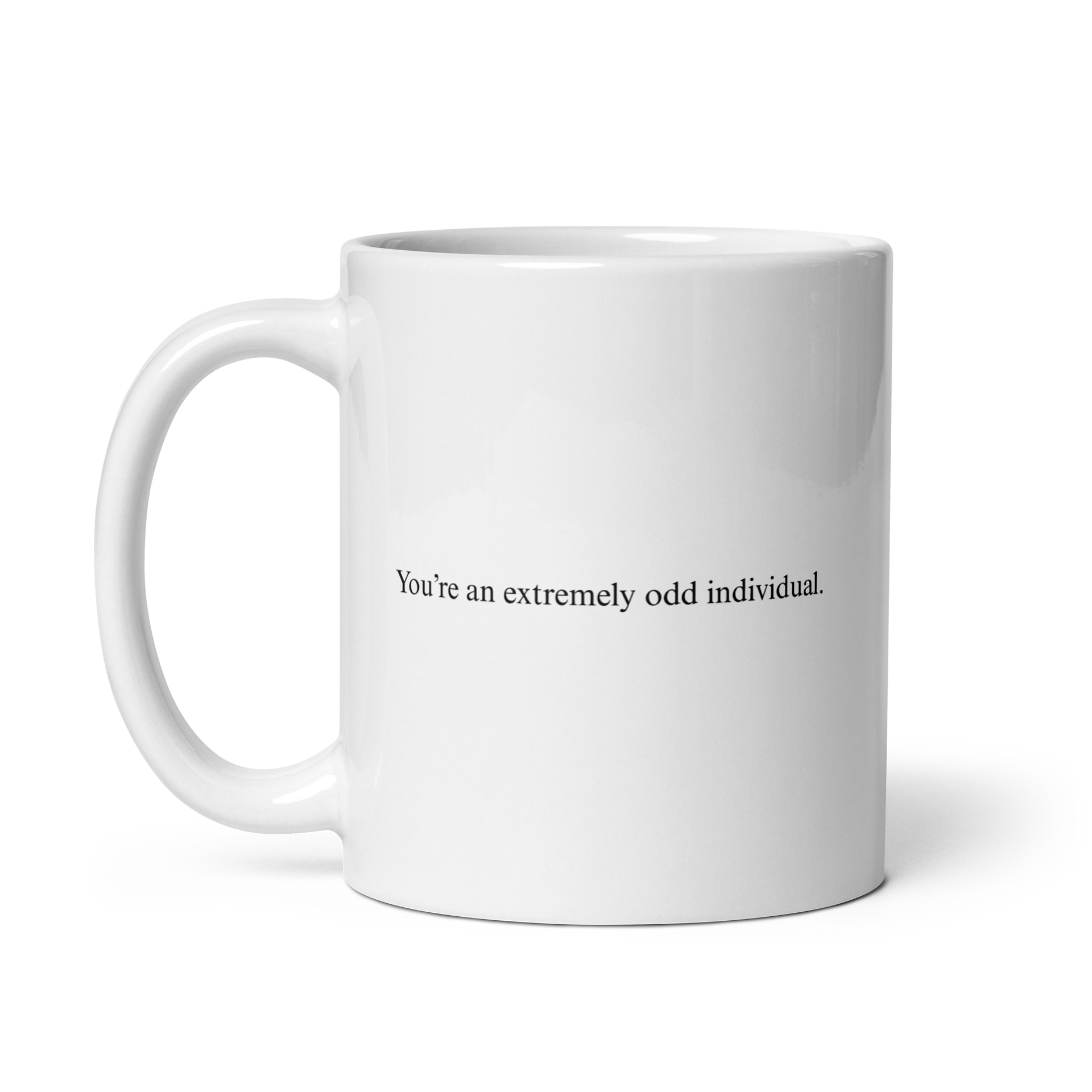 white mug with black text saying "You're an extremely odd individual"