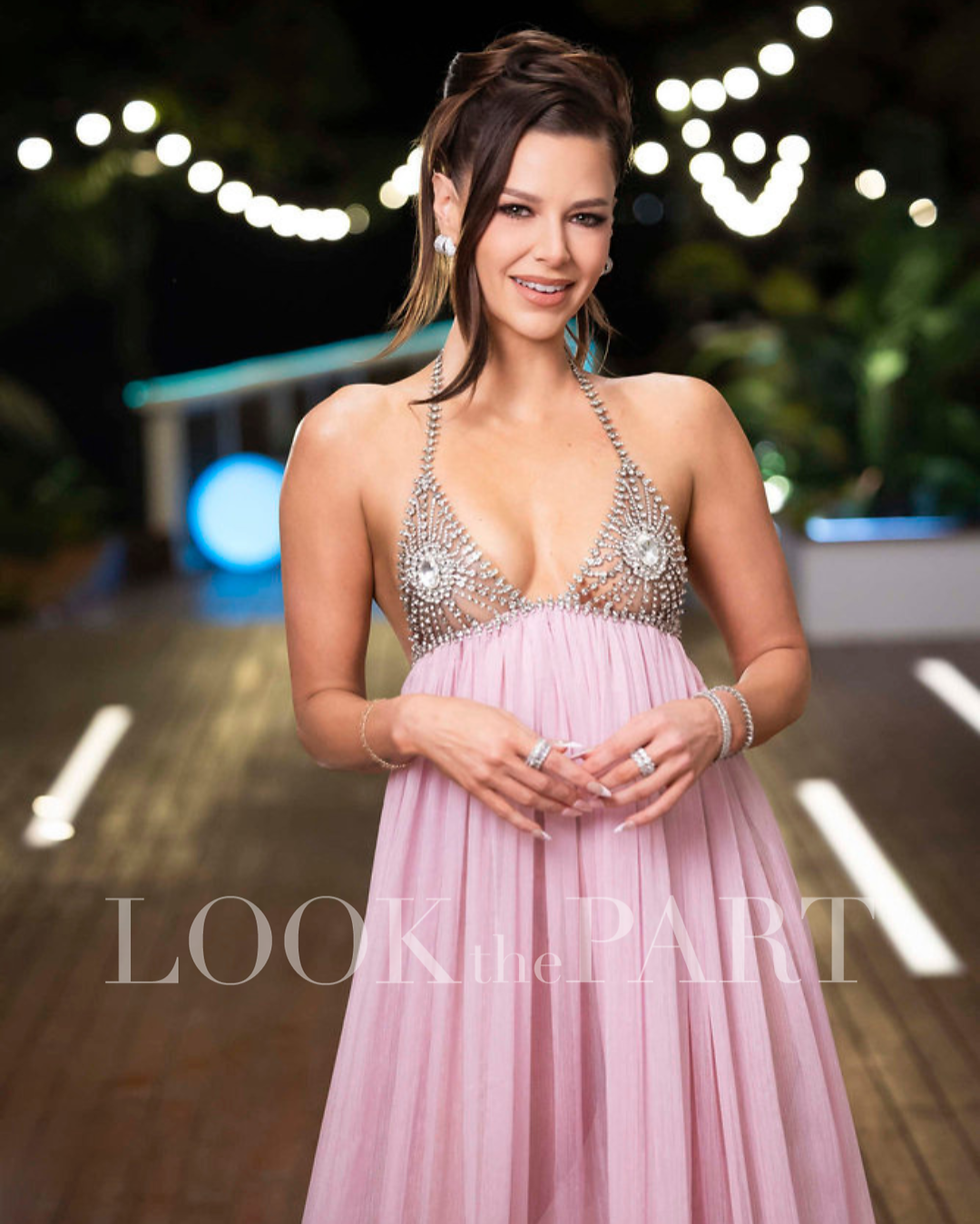 Ariana Madix (Host) in Love Island USA. Image courtesy of Peacock.
