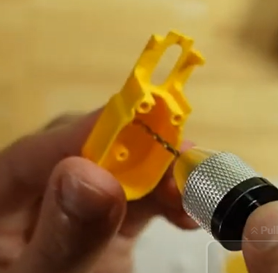 Enlarging the Holes in the Gear Box